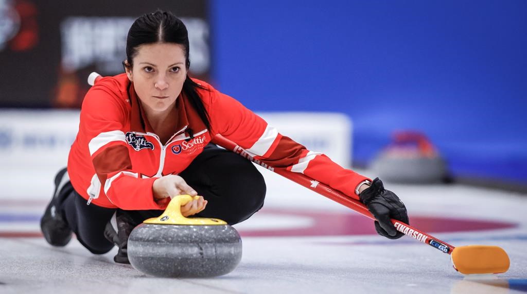 Team Canada skip Kerri Einarson delivers a stone at the Scotties Tournament of Hearts in Calgary, Friday, Feb. 23, 2024. Four-time Canadian champion Einarson is sticking with her current lineup for the upcoming Scotties Tournament of Hearts despite the reinstatement of lead Briane Harris.